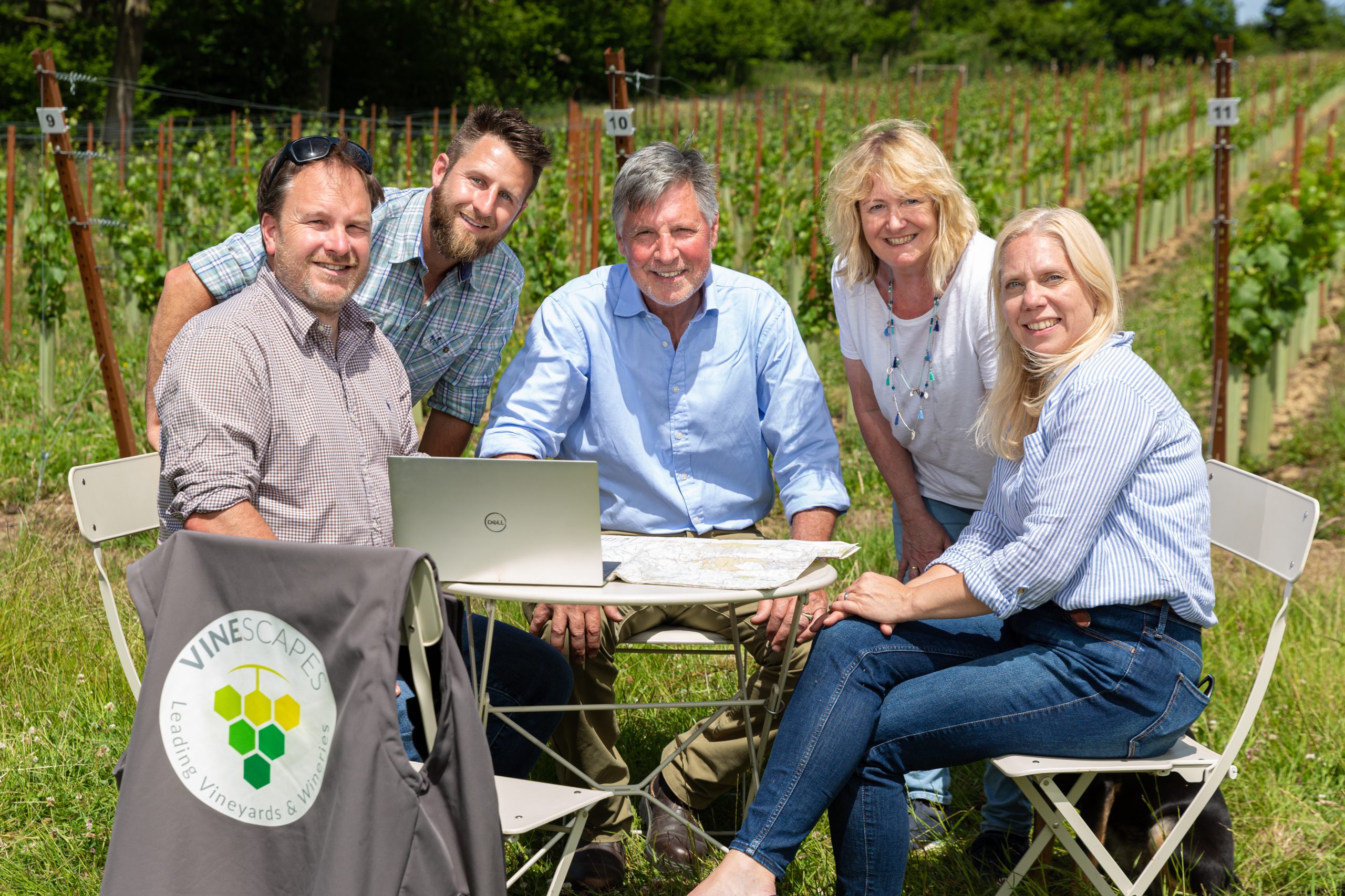 Expert team meeting in vineyard